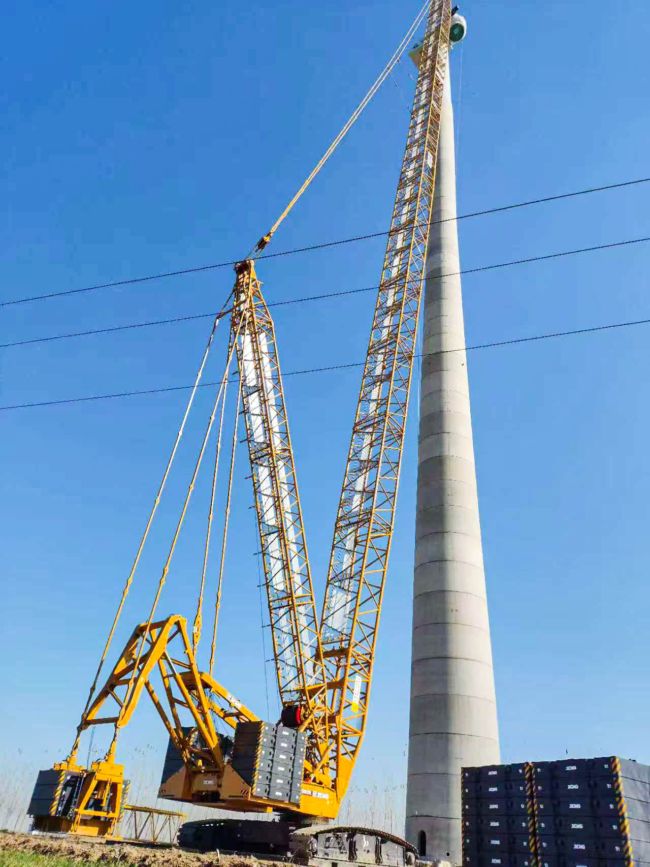 160米高空精准“搭积木”：徐工XLC15000M分体吊装6.25兆瓦风机全纪录